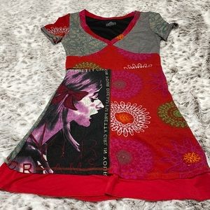 Vintage look dress, predominantly red in color